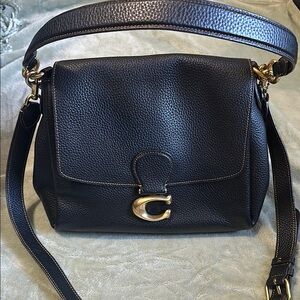 Black and Gold Crossbody Bag with Adjustable Strap and Gold Hardware